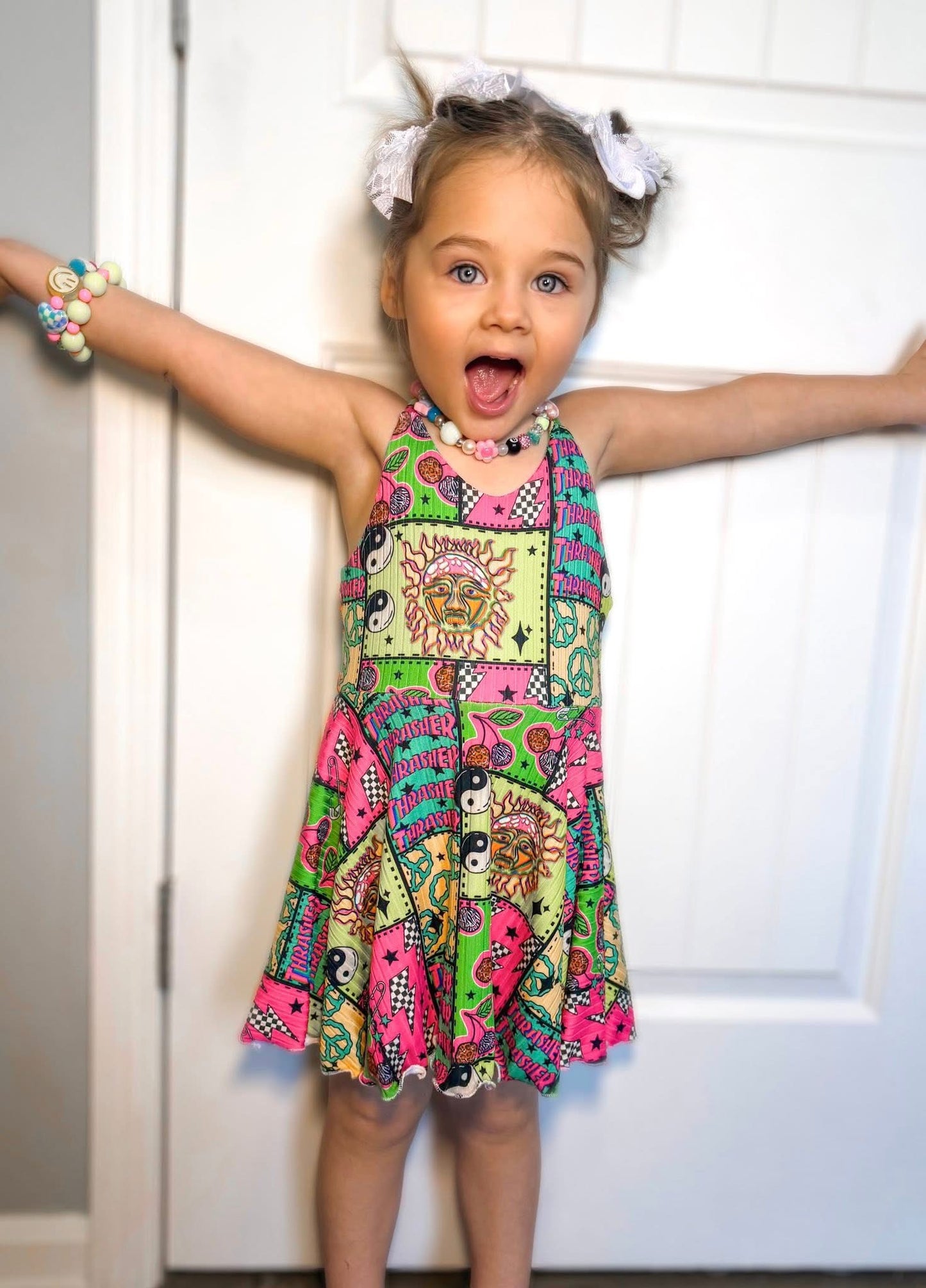 Cross back strap Brielle skirted bodysuit